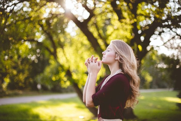 Woman Breathing in Sun